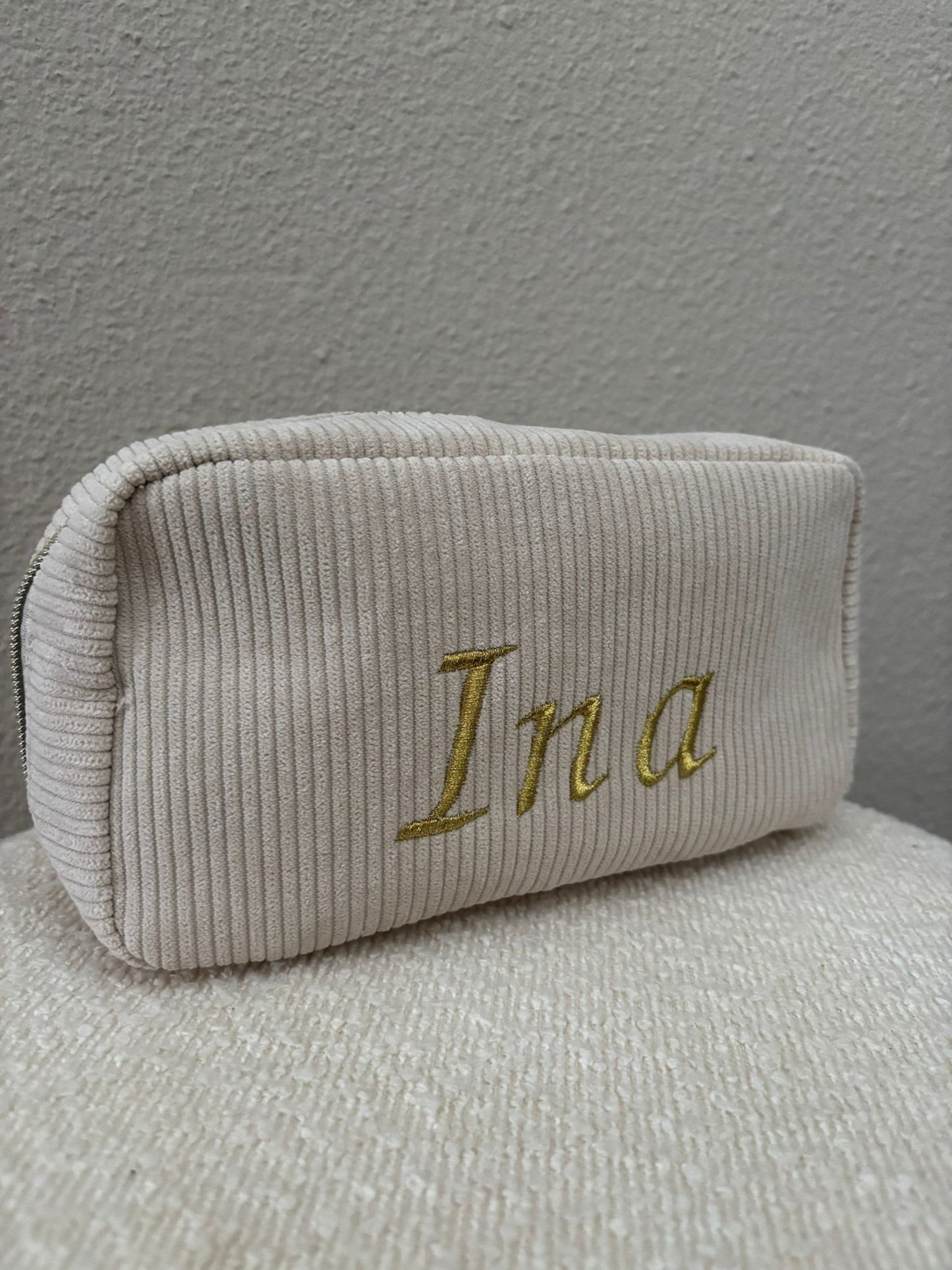 Toilettas geborduurd